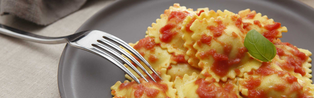 Ravioli in a cream and tomato sauce main image