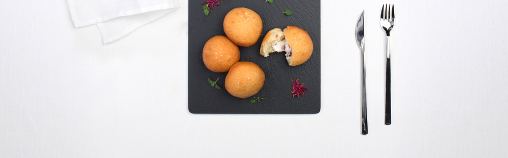 Deep fried bread dough pancakes with mozzarella and bacon main image