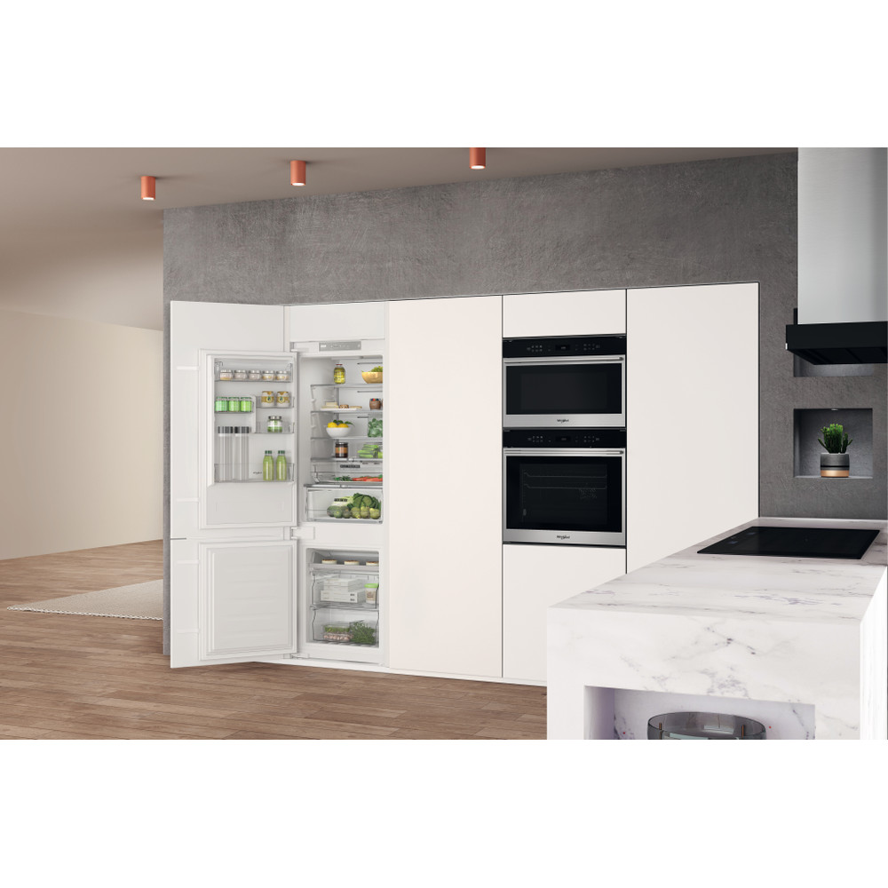 Whirlpool Réfrigérateur combiné Encastrable WHC18 T323 Blanc 2 portes Lifestyle perspective open