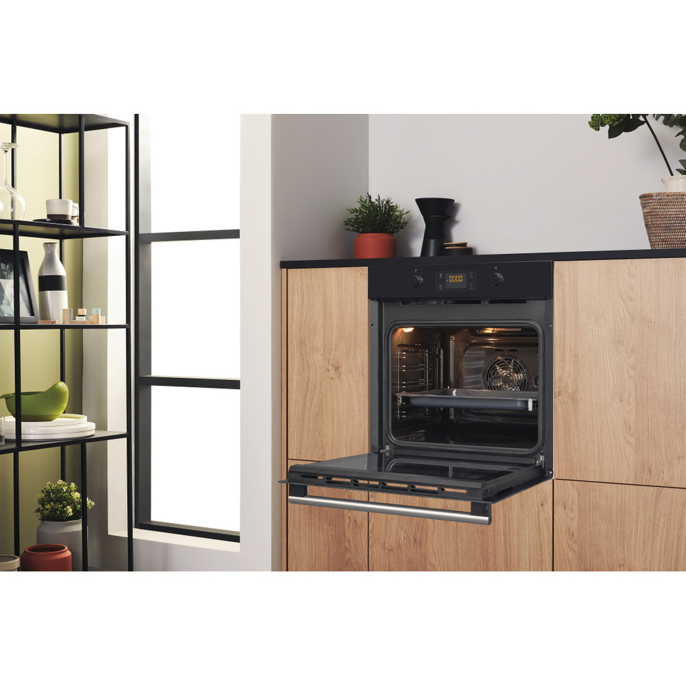Hotpoint_Ariston Fornos Encastre FA2 841 JH BL HA Elétrico A+ Lifestyle perspective open